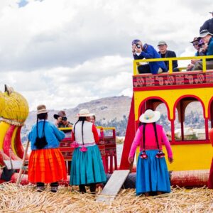 floating-island-of-uros-typical-andean-and-peruvian-clothes-and-colors_t20_WQaR2w-min